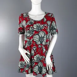 LuLaRoe short sleeve tunic top with hip vents in red floral print. Length 29