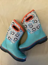 Bogs boots snow rain winter penguin design. Shows some wear and used- tread is worn on soles as pictured.