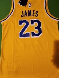 Youth jersey L.A Lakers lebron james #23 size medium color yellow. Open bag to check on size and quality. Everything...