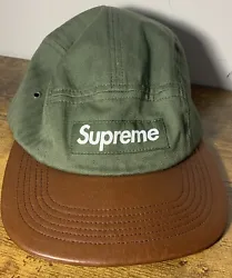Elevate your style with this stylish Supreme 5 panel hat in Olive and Brown. Designed for men, this hat is the perfect...