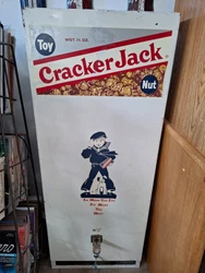 Original 10 cent Crackerjack vending machine. Comes with key. See photos for condition.