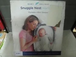 Baby should never be carried in Snuggle Nest. Use to create a more open and protective area for a baby sleeping in an...