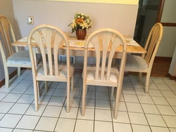 kitchen table and 4 chairs set wooden. Selling quickly, in good condition.