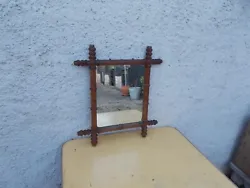 Miroir ancien au mercure cadre imitation bambou. dimensions miroir 31 cm x 25 cm Bon état