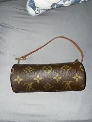 This Louis Vuitton Mini Papillon Pochette Bag is a must-have for any fashion-forward woman. Made with durable Monogram...