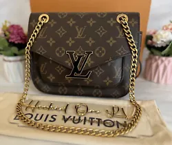 Authentic Louis Vuitton Passy Shoulder/Crossbody handbag. Stunning used condition. I only see two signs of wear. I see...