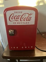 Coca-cola 6-Can Mini Fridge. Semi-loud buzz. Collectors item