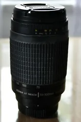 Nikon AF Nikkor 70-300mm 1:4-5.6 G lens. Used in Good condition, with caps. Some oxidation of rubber of zoom ring, no...