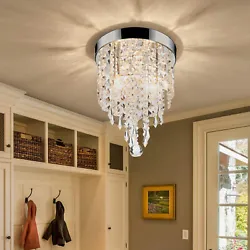 Designed with an eye towards Gatsby-era fashion, the two bulbs nestled within this flush mount chandelier create an...