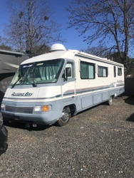 7000 Onan Generator. Cable Ready. You will find clothing storage, a TV, plus a bit of overhead storage too.