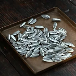50 x Art Ai Weiwei Porcelain Sunflower Seeds. These were the leftover for the exhibition and you wont see that very...