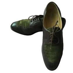 Lace up loafers, forest green suede inset. Looks like 1980s logo. Leather and suede.