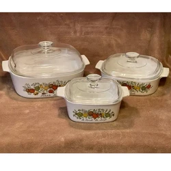 Set includes rare stamped 2Qt & 4Qt baking dishes w/lids, and 1.5Qt w/lid & handle stamp. Nice set of popular sizes, in...