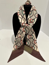 Crafted with high-quality materials, this scarf is perfect for any fashionable woman looking to add a pop of color to...