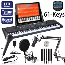 61Key Electric Piano Keyboard+Mic+Music Stand+Adapter. Press the power on/off button and play any white or black...