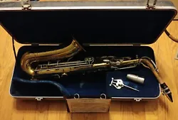 The PARISIAN AMBASSADOR F.E. OLDS & SON SAXOPHONE. Made in France Exclusively for Olds & Son Stamped, what appears to...