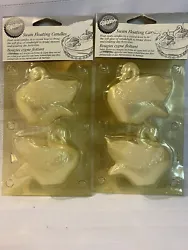 Wilton 2 Packs Of 2 Swan Floating Candles White (But Package Is Tinted Yellow).
