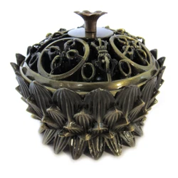 The Lotus incense burner can be used with cones or granular incense. Made of antique bronze color resin, its also great...