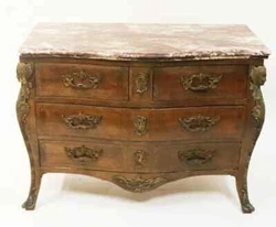 Rouge veined marble serpentine top over conforming case with parquet patterns bronze ormolu decorative drawer handles,...