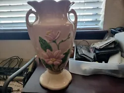 This vintage Hull Art vase is a beautiful addition to any pottery collection. With its pink color and tulip design, its...