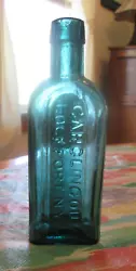 This is a Wonderful Gargling Oil bottle from Lockport N.Y. and it is beauty!! This bottle is a Medium blue green teal...