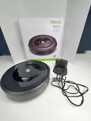 Also has a few scuffs and scratches on it and on the charging base. Includes only the Roomba, its charging base and a...