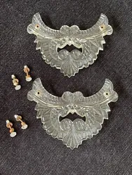 Beautiful pair of antique appliqués with screws. These can be used if a variety of do it your self projects. Wear...