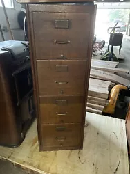 Antique 4 Drawer Solid Oak Filing Cabinet. Slight water damage in the back but other than that great condition and...