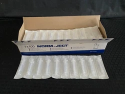 New, open box of 100 syringes. 