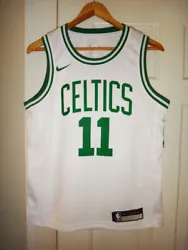 Youth Nike Boston Celtics #11 Kyrie Irving Association Edition White Swingman Jersey. Size: Youth M (10/12). Straight...