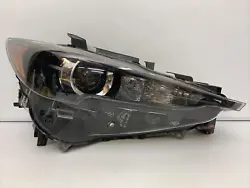 Up for sale is a good working part. It is a passenger side halogen headlight. This is a genuine authentic OEM MAZDA...