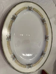 Add a touch of elegance to your dining table with this beautiful Noritake China Pattern Large Meat Platter. Featuring...