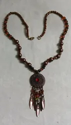 This necklace is nifty. It is in good condition with no missing pieces.