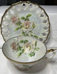 Vintage Cherry China Japan Tea Cup and Saucer. Beautiful light pink/ yellow roses, green leaves. Gold trimmed. Pattern...