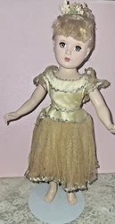 NINA BALLERINA DOLL. UNDER SKIRT W/PANTALOOMS WITH SNAP. HER HAIR IS STYLED WITH FLOWERS.