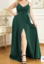 Brand new, never worn. Tag removed with intention of wearing, but never did. Plus size green formal or prom dress with...