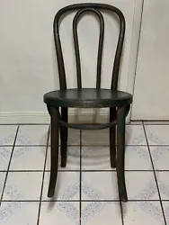 Pictures show condition of chair. The right front leg needs to be tightened.