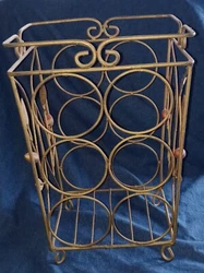 This vintage metal wine bottle holder is a must-have for any wine lovers collection. Crafted with high-quality metal,...