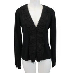 Hidden loop and button fasteners (see photos). Can also be worn as a pullover.