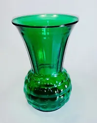 Add a touch of vintage charm to your home decor with this beautiful emerald green glass pineapple vase by Anchor...