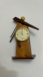 Small Executive Desk Clock. I’ve owned it for years and it’s in near perfect condition. 6” tall at its tallest...