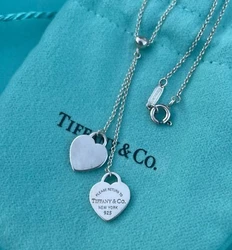 Pendant Drop:2”. On a 18” chain. Chain length: 16”.