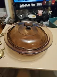 This is a nice casserole dish with no cracks or chips. It is amber in color and holds 1.5 qts.