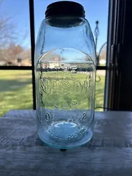 One circle square 1/2 gallon jar and plain zinc lid. This is the typical sky blue color and there is 1 small chip on...