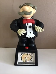 Reveil musical Sunk Figurine Chef Orchestre Musique Beethoven. Le réveil ne fonctionne pas.En appuyant sur le bouton...