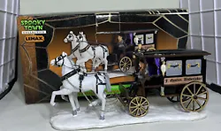 This Lemax Spooky Town Undertakers Carriage from the Halloween Collection comes in the original box. It features a...