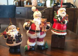 Carefully, each Santa is different, and I have just grouped them together. Each Santa also has a different material...