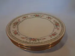 The pieces have a green and yellow border design with floral sprays. Noritake China - Homage. 4 Bread Plates.