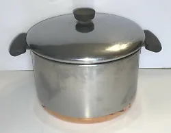 Lid is included. This pot has seen heavy use and there are a few dents in the lid.