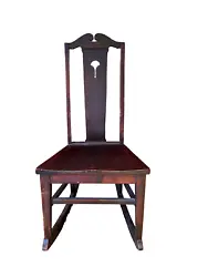 Description: This is a unique find of an early 20th Century armless rocking chair made by JS Ford & Johnson Furniture...